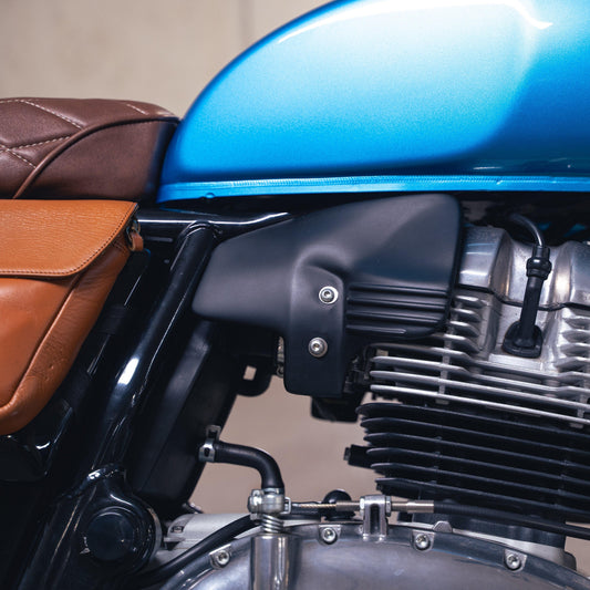Bonvent heat shield air deflector installed under the tank on a blue Royal Enfield Interceptor 650
