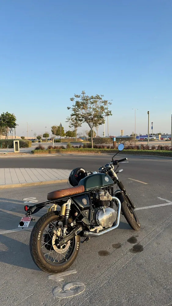 John.R's Royal Enfield Continental GT 650 in Qatar fitted with GT 650 Single Seat for Interceptor 650 & Continental GT 650 Solo Seat, Bullet Indicators for Café Racer Motorcycles – Pair, Interceptor 650 & GT 650 Indicator Adapters – Front or Rear Pair