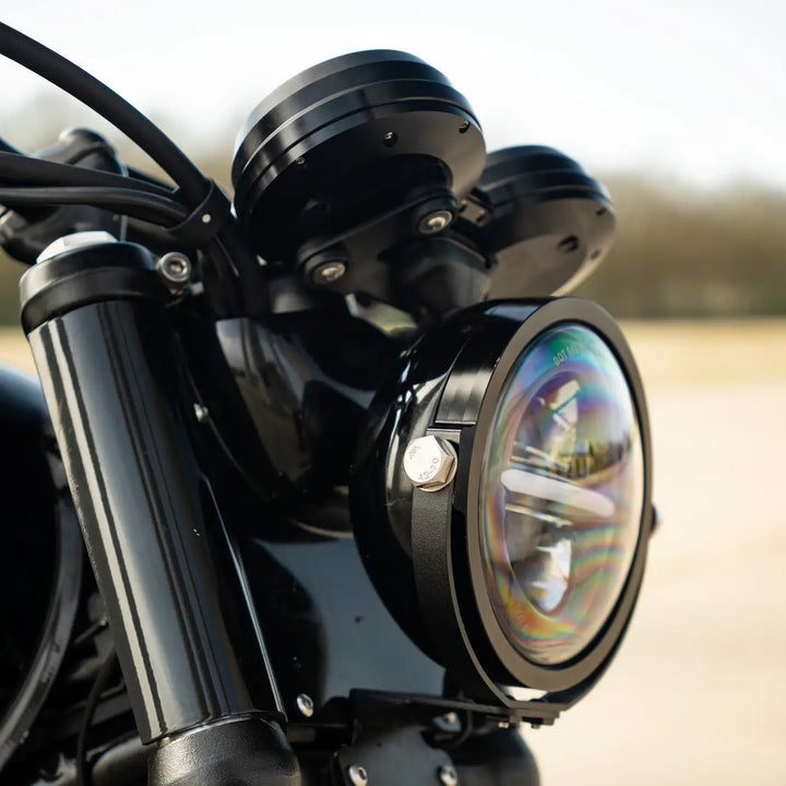 Close-up of Bonvent CNC aluminium speedometer housing on a Triumph twin-clock cockpit