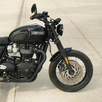 Vintage café racer front mudguard installed on a Triumph Bonneville LC bike