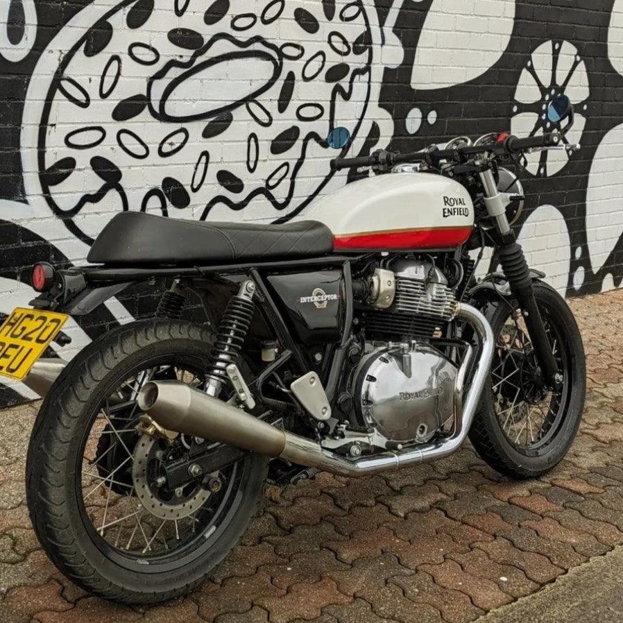 Rear view of Royal Enfield Interceptor 650 with compact tail light, license plate holder and indicators