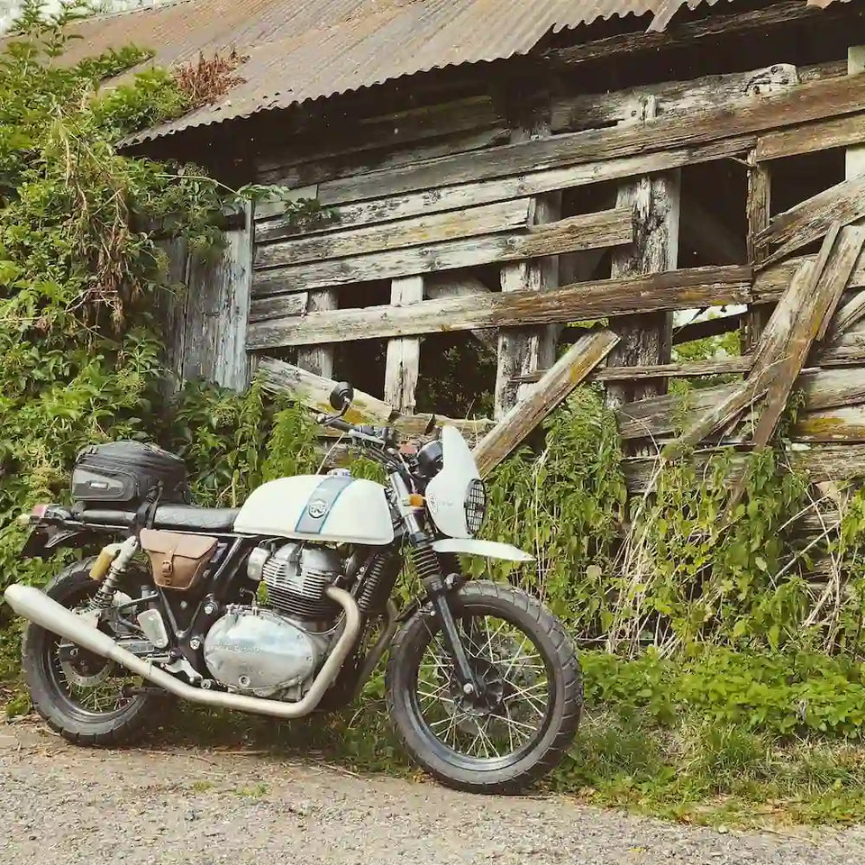 Royal Enfield Continental GT 650 in United Kingdom fitted with Interceptor 650 High Front Mudguard for Scrambler Builds, Headlight Cowl for Interceptor 650 & GT 650