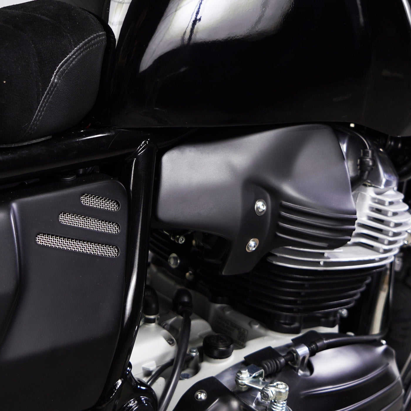 Close-up of Bonvent air deflector mounted beside the engine on a Royal Enfield 650