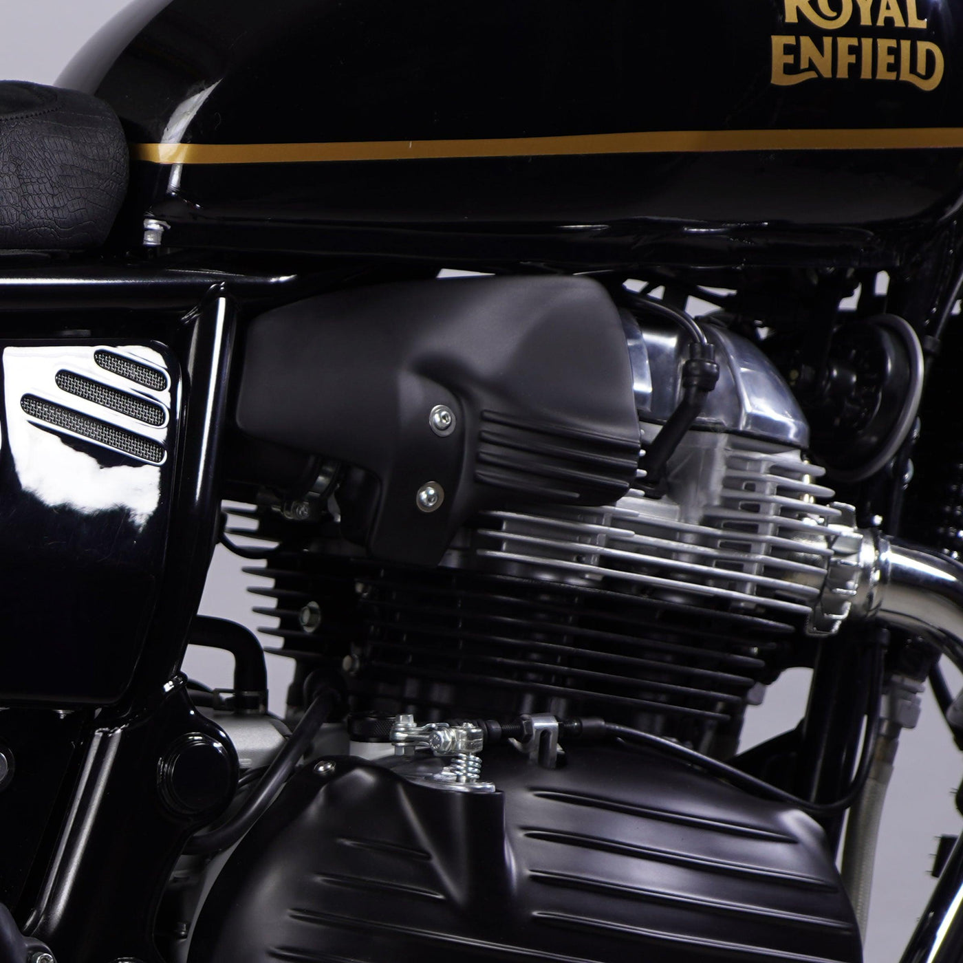 Bonvent air deflector installed below the tank on a Royal Enfield 650 for rider heat protection