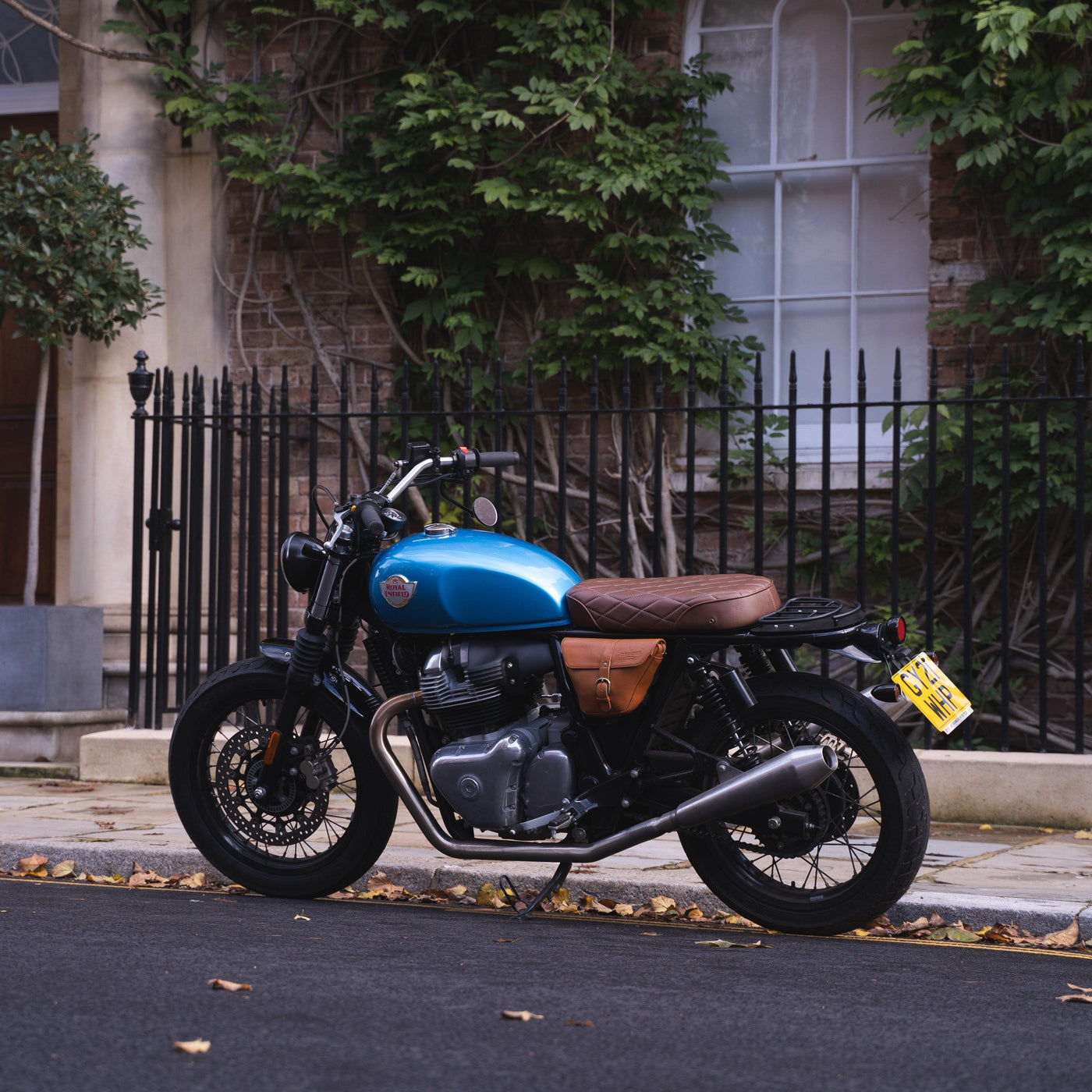 Side view of a blue Royal Enfield Interceptor 650 with Bonvent air deflectors for engine heat protection