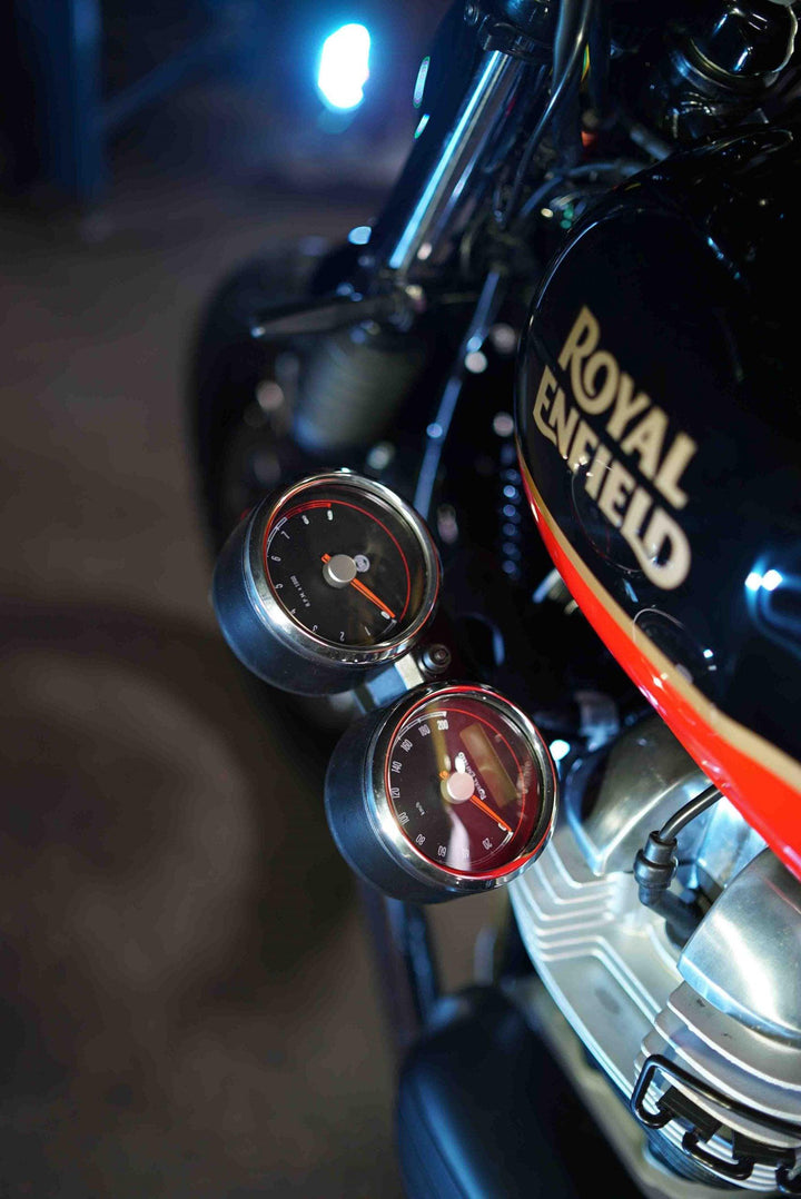 Clean front-end speedometer relocation mount on custom Royal Enfield 650
