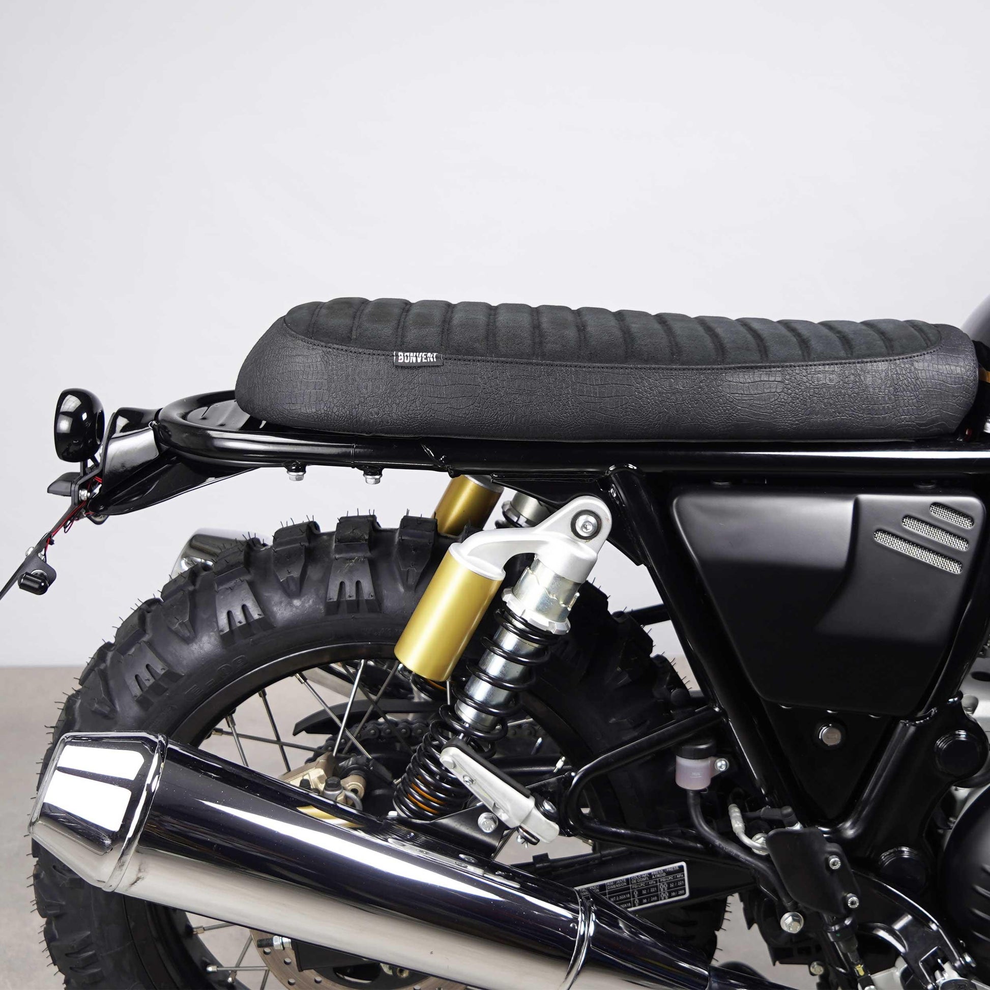 Comfortable saddle in suede croco design, one of the best accessories for scrambler Royal Enfield bikes.