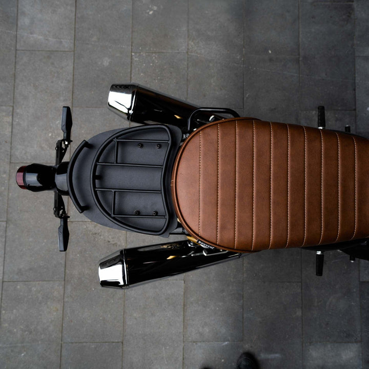 Custom bike luggage rack for Royal Enfield Interceptor 650. Enhanced practicality for all rides.