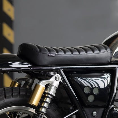 Custom accessories for Royal Enfield 650 scrambler builds by Bonvent Motorbikes. Includes rear mudguard, seat, and lighting