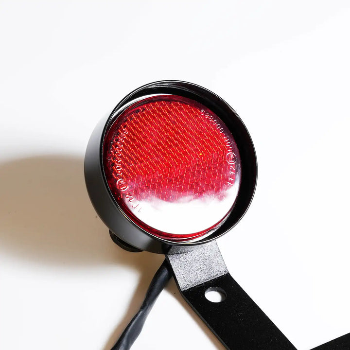 Round LED tail light with black housing for Triumph Bonneville T100 and T120 tail tidy kit
