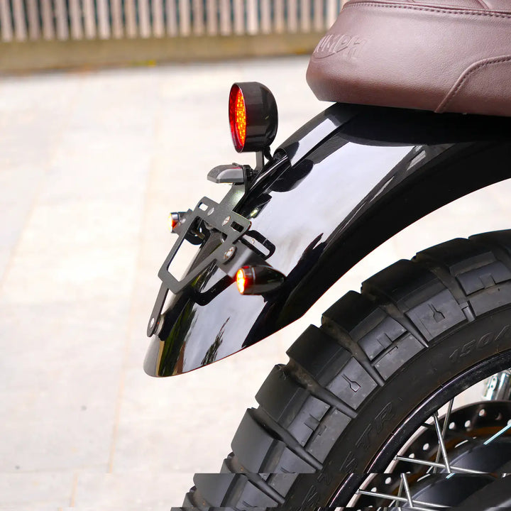Under-seat fitment detail of Triumph Bonneville T100 and T120 tail tidy and tail light kit