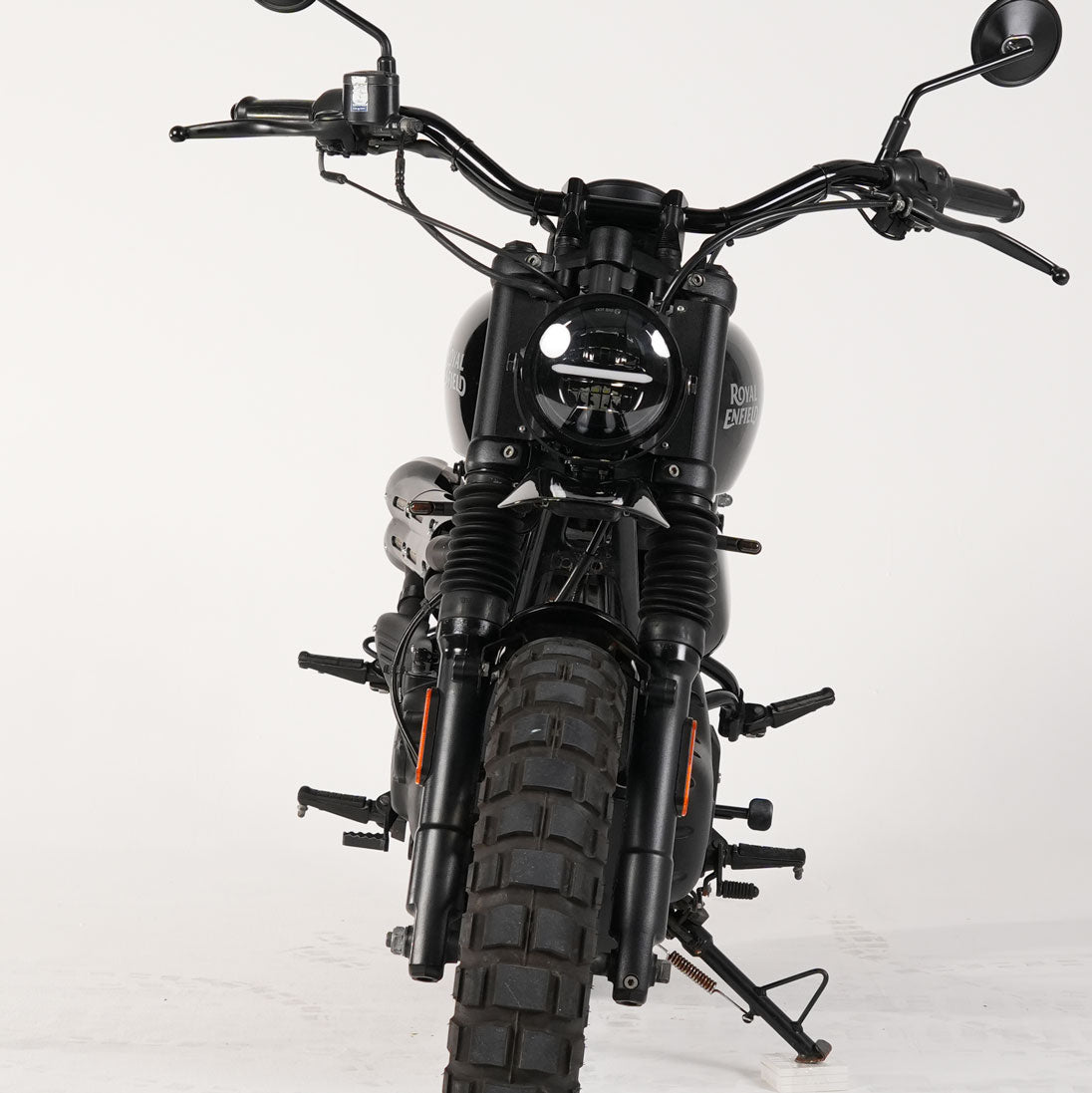 Custom Royal Enfield Hunter 350 scrambler front-end with LED indicator brackets and scrambler tires