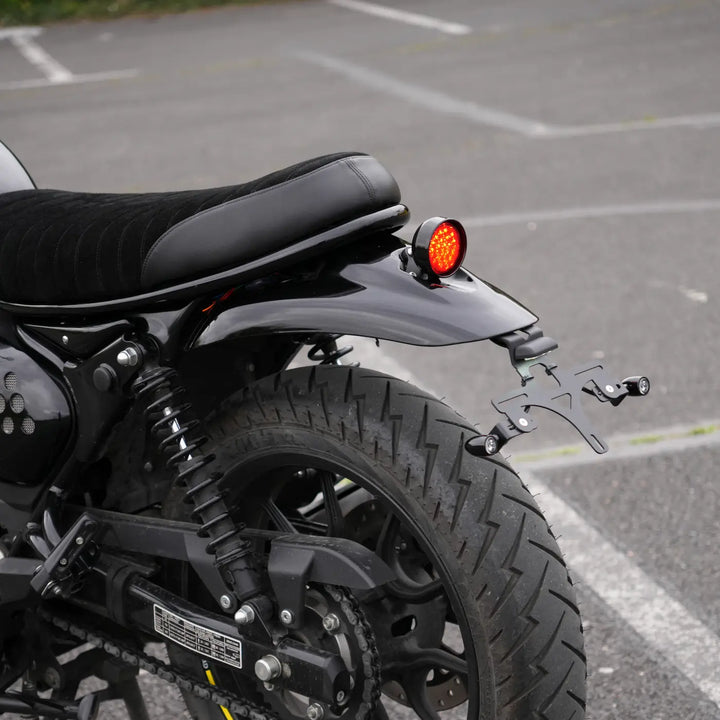 Rear view of Bonvent Hunter 350 tail tidy and E-Mark / CE LED tail light kit installed with compact license plate holder and plate light.