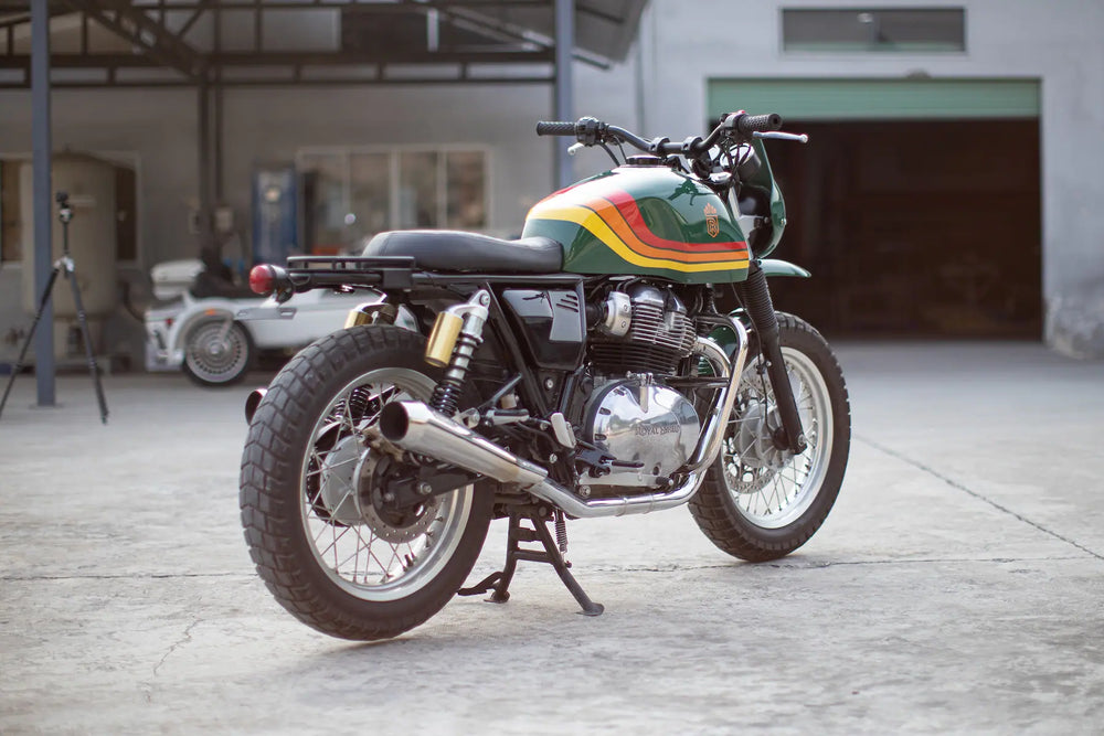 Rear three-quarter view of a British Green Interceptor 650 with early Bonvent modular seat components