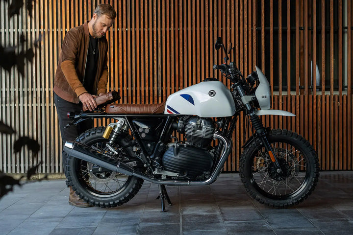 Side profile of Royal Enfield Interceptor 650 Dakar build with Bonvent modular solo seat and luggage rack