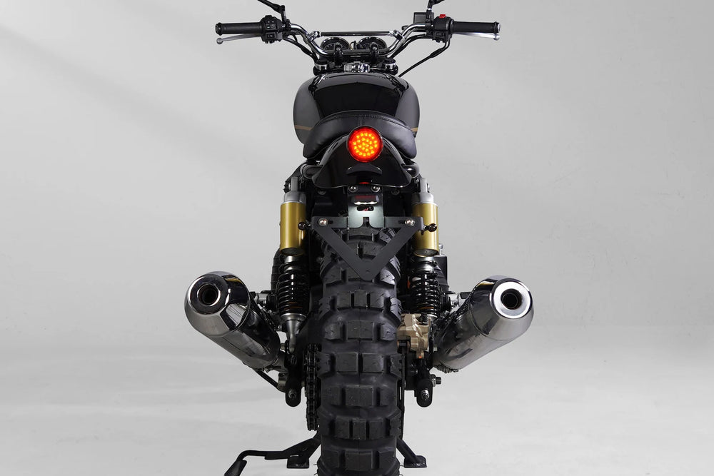 Rear view of an Interceptor 650 scrambler with compact LED tail light and license plate holder