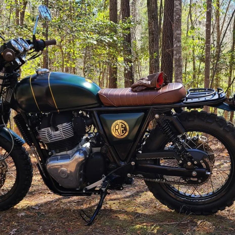 Plug-and-play custom seat kit for Royal Enfield motorcycles. Includes luggage rack and tail light.