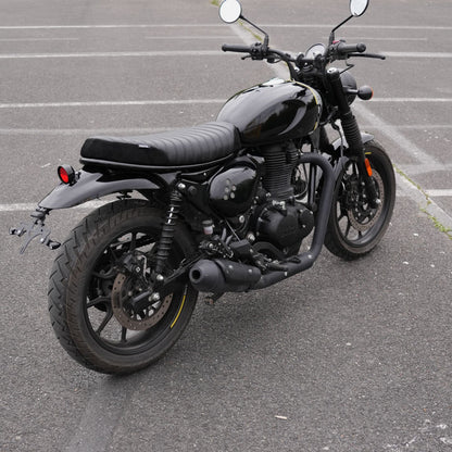 Black ribbed suede motorcycle seat installed on Royal Enfield Hunter 350 with custom parts and scrambler accessories