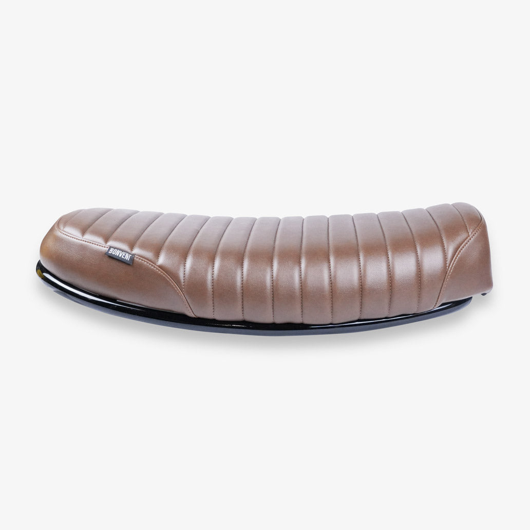 Brown ribbed motorcycle seat for Royal Enfield Hunter 350 custom scrambler and cafe racer build with handcrafted custom parts
