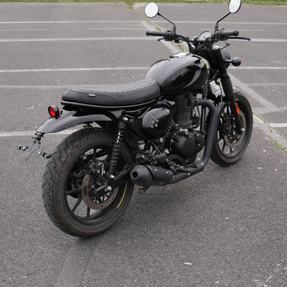 Modern black ribbed seat for Royal Enfield Hunter 350 with custom scrambler and cafe racer motorcycle styling