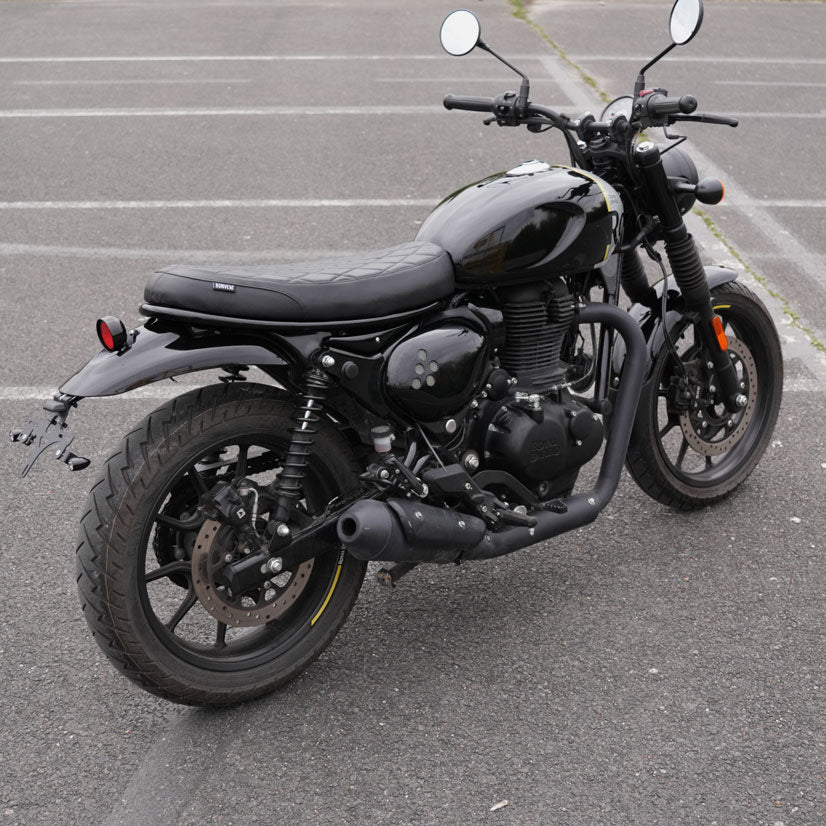 Modern rally style flat seat for Royal Enfield Hunter 350 scrambler build with custom motorcycle accessories and handcrafted design