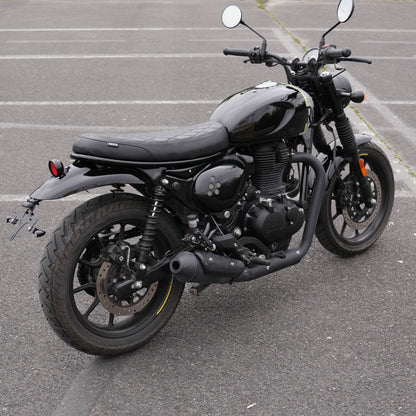 Modern rally style flat seat for Royal Enfield Hunter 350 scrambler build with custom motorcycle accessories and handcrafted design