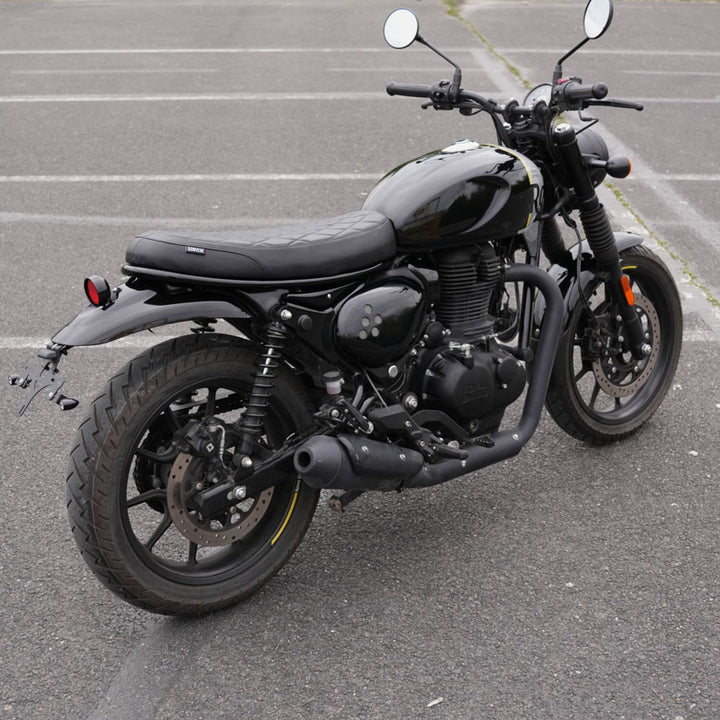 Modern rally style flat seat for Royal Enfield Hunter 350 scrambler build with custom motorcycle accessories and handcrafted design