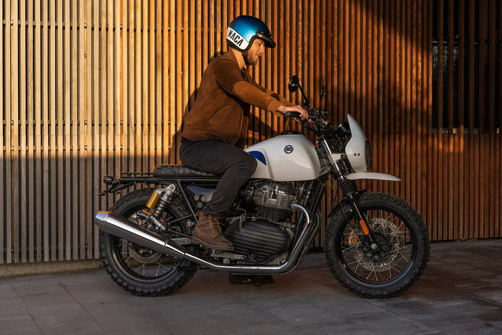 Rider on a Royal Enfield Interceptor 650 Dakar build fitted with Bonvent plug-and-play custom parts