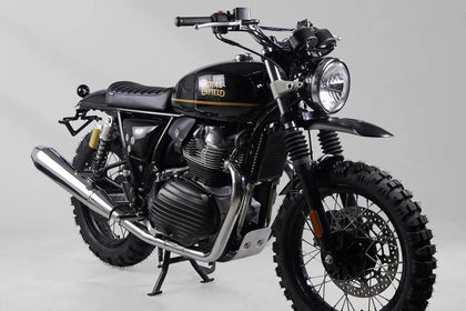 Front three-quarter view of a black and gold Royal Enfield Interceptor 650 scrambler build