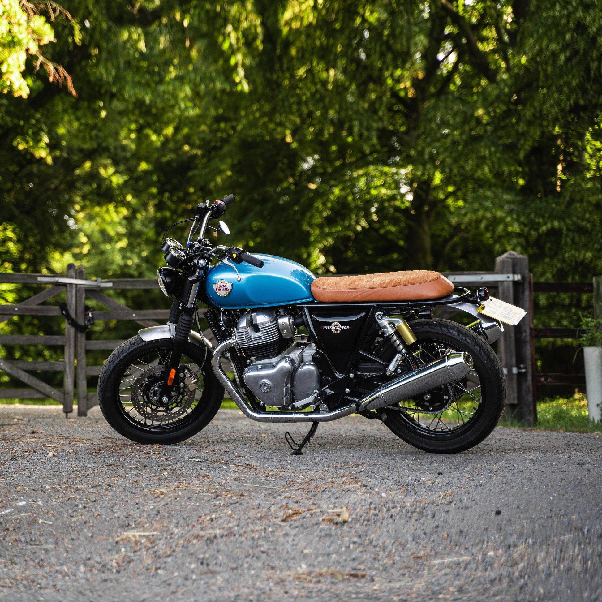 Stylish Flat Seat in Brown Suede for Royal Enfield bikes. Best accessories for scrambler builds