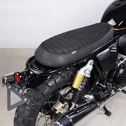 Suede leather seat with flat classic design, perfect for scrambler and cafe racer Royal Enfield bikes.