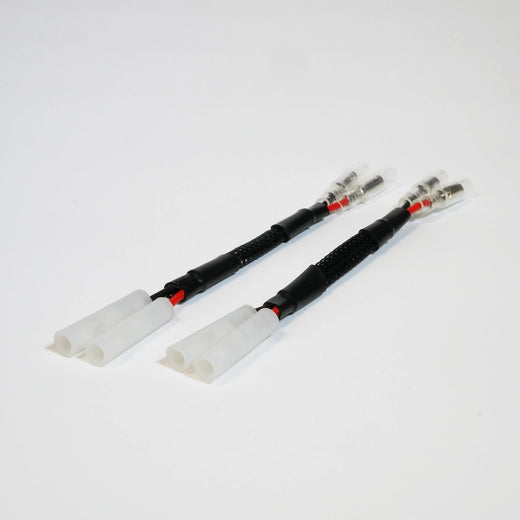 Triumph plug and play indicator adapters with 3.5 mm bullet connectors sold as a pair