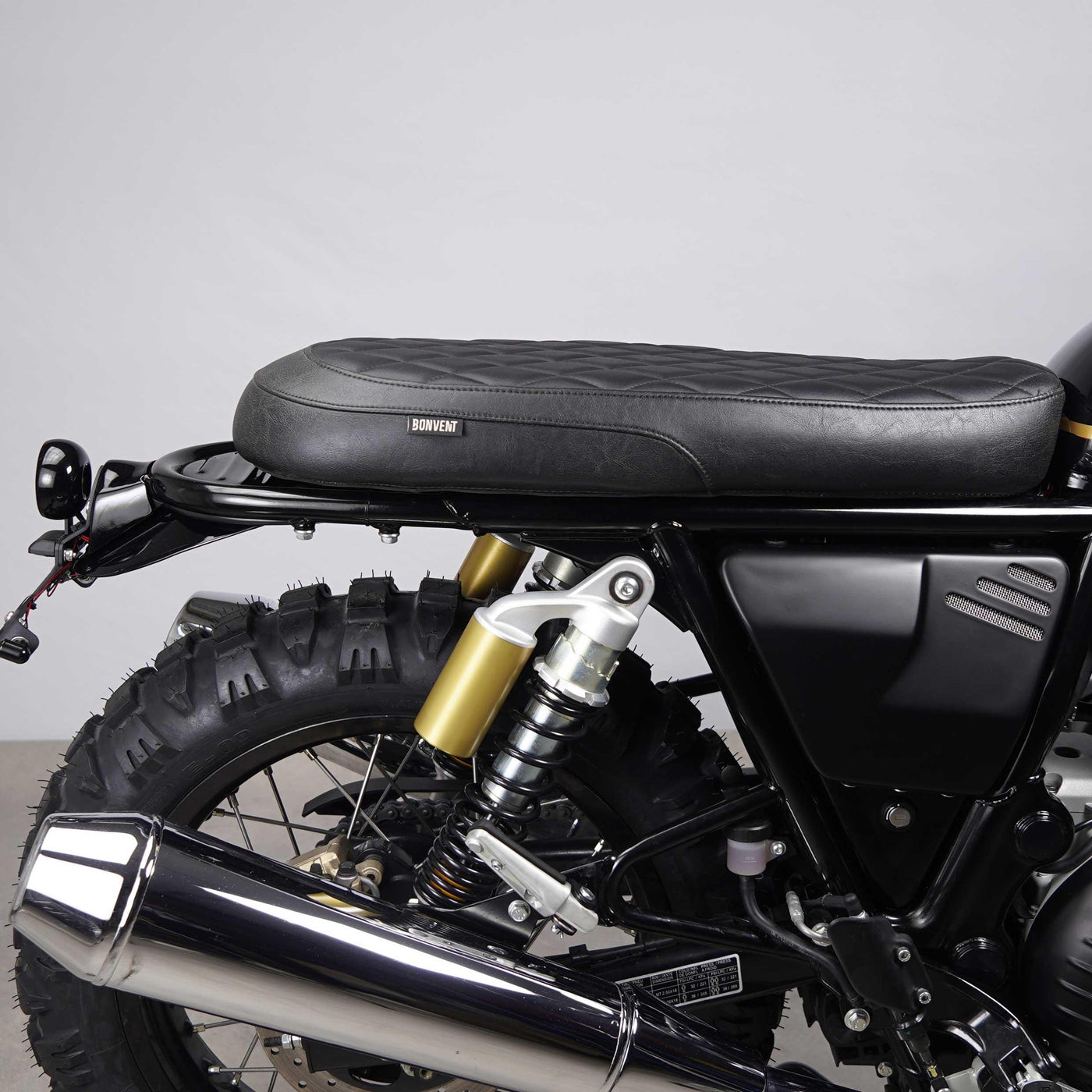 classic cafe racer seat side view fitted on a Royal Enfield Interceptor 650